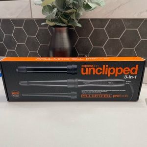 NIB never opened Paul Mitchell unclipped 3-in-1 wrapping iron set.
